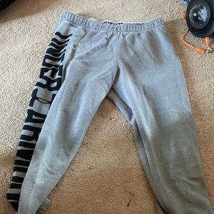 Under armor sweats .